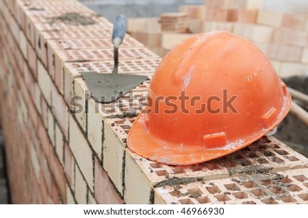 Construction equipment for brick building work helmet trowel and pecker