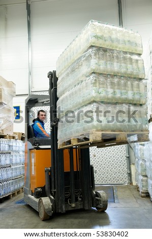 truck loader forklift with full load onpallet in a warehouse