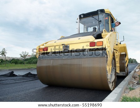 Heavy Vibration roller at asphalt pavement works (road repairing)