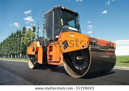 Heavy Vibration roller at asphalt pavement works (road repairing)