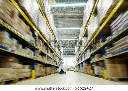 long stack arrangement of goods in a wholesale and retail warehouse depot