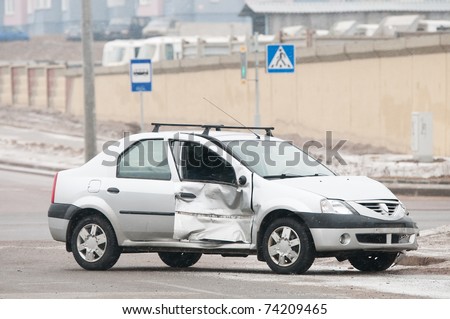 damaged car after crash accident standing on street
