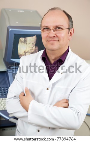 Male doctor with ultrasonic equipment during ultrasound medical examination