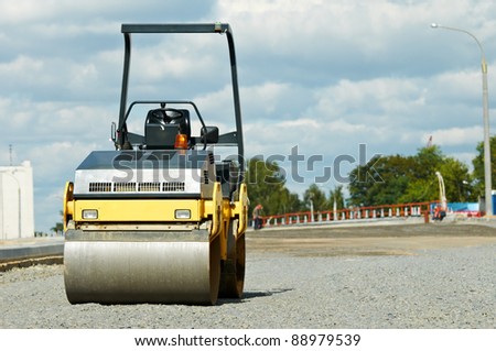Light Vibration roller compactor at road construction and repairing asphalt pavement works
