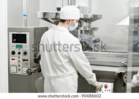 pharmaceutical factory worker at pharmacy industry manufacture
