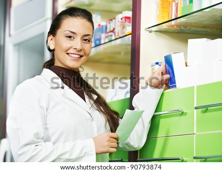 pharmacist chemist woman standing in pharmacy drugstore with recipe