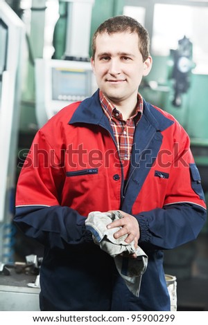 mechanical technician near cnc milling machine center at tool workshop
