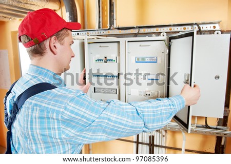 One electrician working with distribution fuseboard