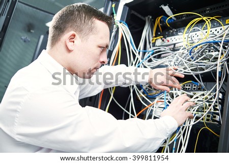 network engineer administrating in server room