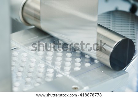 tablet pill production. Blistering conveyer