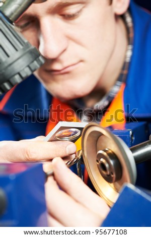 mechanical technician worker measuring detail tool after sharpening cutting machine center at workshop