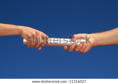 stock photo : hands passing the baton