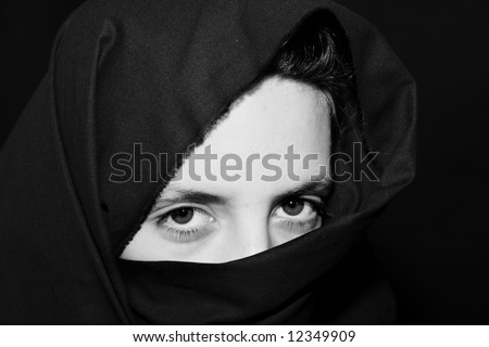 Beautiful eyes looking from above her veil