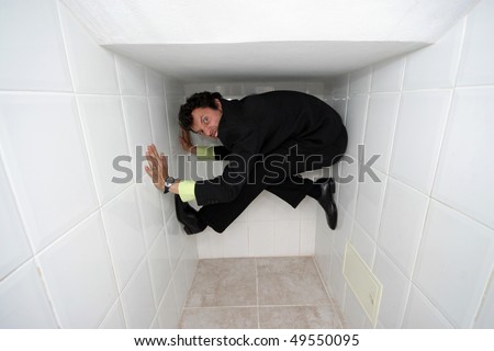silly businessman over white background