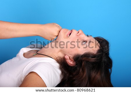 woman having punch, fight scene, studio photo