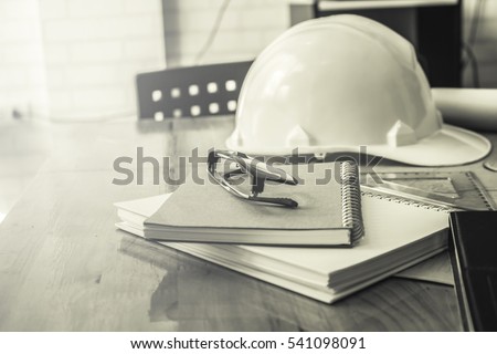 image of the architectural project engineer. Vintage tone and engineering tools in the workplace.