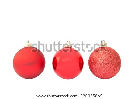Christmas toys for the Christmas tree and new year, three beautiful red balls isolated on the white background.