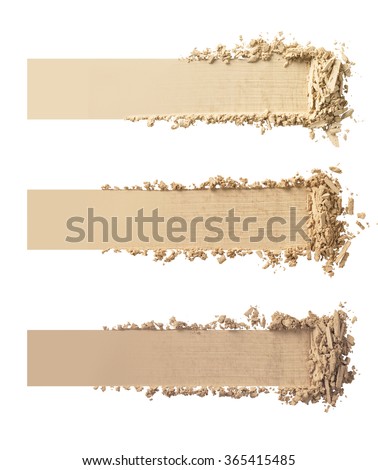 Three shades of makeup powder on white background.
