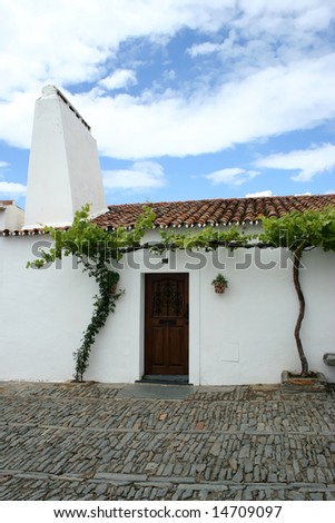 typical white house in interior of portugal, alentejo