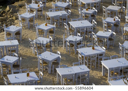 Tables are Set for Outdoor Dinner on Mykonos Island, Greece