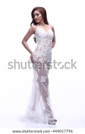 Asian Thai Female Woman Model Tan Skin in Lace See Through White Wedding dress with Tiara and High Heel, Fashion Make Up, Studio Lighting on White Background