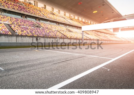 Empty board above an international racetrack.