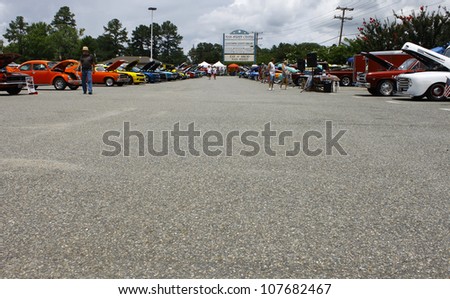 GLOUCESTER, VA- JULY 14:A line of classic and antique cars at the Annual Blast from the past car show at the Main St shopping center in Gloucester, Virginia on July 14, 2012.