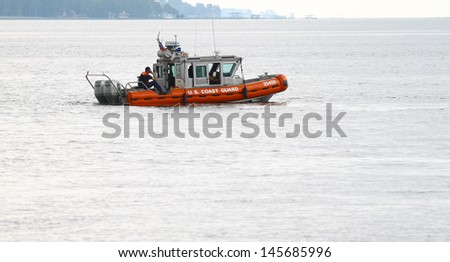 YORKTOWN, VIRGINIA - JULY 11: A US Coast Guard Defender Class Boat patrolling the waterways of the York river and Chesapeake Bay, Virginia on July 11, 2013.The Coast Guard is part of the U.S. DHS