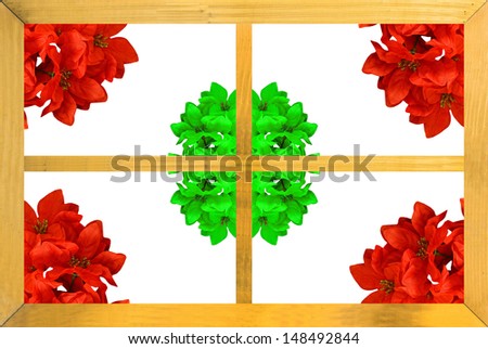 A wooden window frame with poinsettia flowers in the corners for the celebration of Christmas with copy space and room for text.