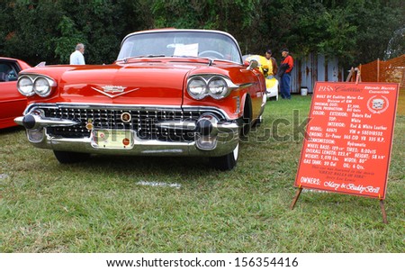 TOPPING, VA- SEPTEMBER 28: A red 58 Cadillac Eldorado convertible at the 18th Annual Wings, Wheels and Keels event at Hummel Air Field Topping Virginia on September 28, 2013