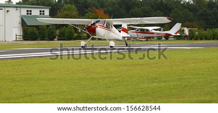 TOPPING, VA- SEPTEMBER 28: A small Cessna 140 airplane preparing for takeoff at the 18th Annual Wings, Wheels and Keels event at Hummel Air Field Topping Virginia on September 28, 2013