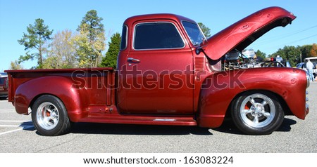 GLOUCESTER, VA- NOVEMBER 9: A 1947 Chevrolet Pickup in the Shop with a Cop Car Show in Gloucester, Virginia on November 9, 2013