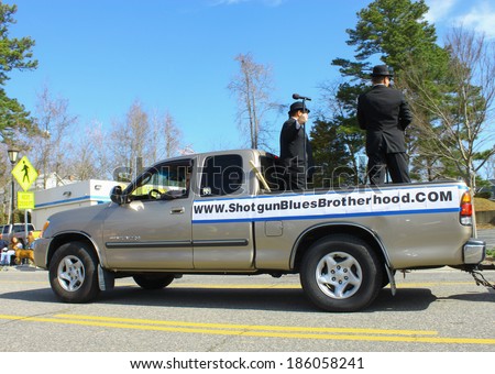 GLOUCESTER, VA - April 5, 2014: The Shotgun Blues Brotherhood band in the Daffodil parade, The Daffodil fest and Parade is a regular event held each spring
