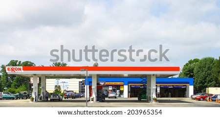 NEWPORT NEWS, VIRGINIA - JULY 3, 2014: An Exxon gas and service station on Jefferson Ave in Newport News VA. Exxon Mobil is the 3rd largest company in the world by revenue (420 billion USD in 2013).