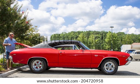 GLOUCESTER, VIRGINIA - JULY 12, 2014: A Red 1969 Chevelle SS396 in the Blast from the PAST CAR SHOW,The Blast From the Past car show is held once each year in July in Gloucester Virginia.