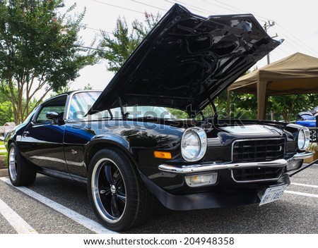 GLOUCESTER, VIRGINIA - JULY 12, 2014:A black 1973 Z/28 Chevy Camaro in the Blast from the PAST CAR SHOW,The Blast From the Past car show is held once each year in July in Gloucester Virginia.