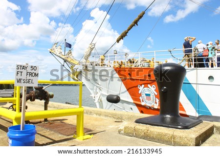 GLOUCESTER, VA - SEPTEMBER 6, 2014: The USCGC Eagle front bow of the ship Eagle at the Yorktown Coast guard training center pier where it is tied up on the York river in Virginia