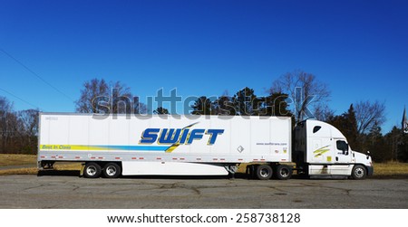 GLOUCESTER, VIRGINIA - JANUARY 28, 2015: A Swift delivery truck Parked to the side of the road, Swift is North America\'s Largest Full Truckload Carrier, Swift Transportation began operations in 1966.
