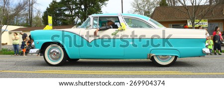 GLOUCESTER, VA - April 11, 2015: A vintage classic 1955 Ford Crown Victoria at the 29th annual Daffodil fest and parade, The Daffodil fest and Parade is a regular event held each spring