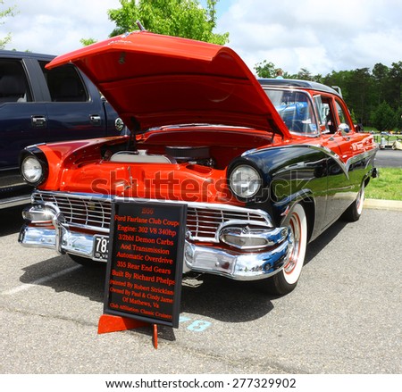 WILLIAMSBURG, VA - May 9, 2015: An old two tone 1956 Ford Fairlane at the 6th Annual Project Lifesaver Car Show in Williamsburg Virginia on a summer day.