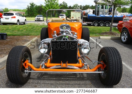 WILLIAMSBURG, VA - May 9, 2015: An old 1923 Ford T-Bucket coupe hot rod at the 6th Annual Project Lifesaver Car Show in Williamsburg Virginia on a summer day.