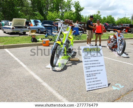 WILLIAMSBURG, VA - May 9, 2015: Two customized motorcycles at the 6th Annual Project Lifesaver Car Show in Williamsburg Virginia on a summer day.