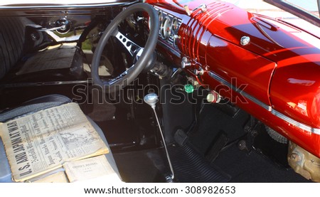 GLOUCESTER, VIRGINIA - AUGUST 22, 2015:A 1941 red Chevrolet truck interior in the DRIVE-IN FOR DIABETES CAR SHOW Sponsored by Tractor Supply in August in \
Gloucester Virginia.