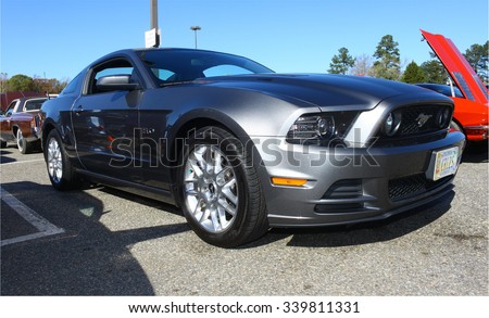 GLOUCESTER, VIRGINIA - NOVEMBER 14, 2015: A 5.0 Litre Ford Mustang in the annual Shop With a Cop Car Show held once each year to help benefit needy children of Gloucester for Christmas.