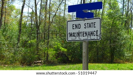 An end state maintenance sign with a street cross road sign with room for the name of your road to be added as needed