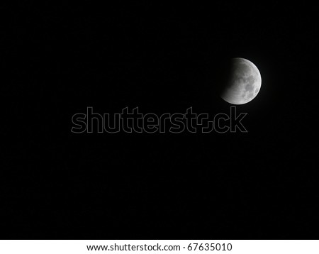GLOUCESTER VA - DECEMBER 21: A Historic Lunar Eclipse coinciding with the winter solstice seen in the night sky on Dec. 21, 2010 in Gloucester Virginia
