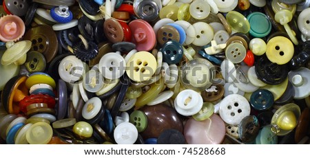 A collection of an assortment of all shapes and sizes of clothing buttons.