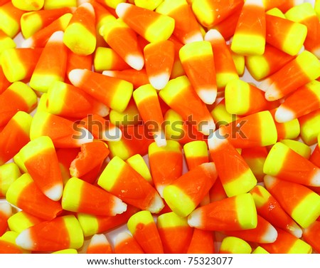 A whole bunch of candy corn for your Halloween or Thanksgiving needs with room for your text.