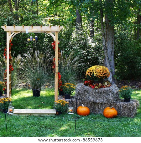 stock photo A handmade wooden Arch decorated for a wedding in the setting