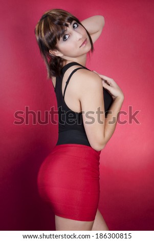 Brazilian Woman in Black Top and Pencil Skirt